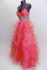 Full length A-line Mac Duggal , coral organza gown, has layers of curly organza ruffles, ruched crossover bust a and a wide Swarovski crystal waistband. Side