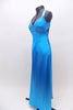 Floor length satin turquoise gown has jeweled trim at bust. The straps from the shoulder and bottom of bust line cross over at back. Has long chiffon train. Side