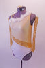 Gold & white single shoulder leotard has a light gold shimmery bust & white bottom separated by a gold sequin angled gold straps banded at the waist. The bust is lined with white marabou feather. The right shoulder has double straps that angle out at the back. Comes with gold sequined gauntlets & hair accessory. Left side