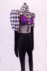 3-piece costume has a purple sequined bra (34B), with crystals, double back band & black ruffle. The black and white harlequin shrug has a mandarin collar and pouffe sleeve that is black from elbow down. There is a center strap that extends down the center of the torso to the waist of black leggings. Side