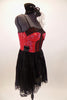Red and black bustier dress has crystaled lace edging on skirt. Bustier has lace torso & bust. & hundreds of  Swarovski crystals. Comes veiled top-hat accessory. Right side