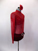Sheer red short crystaled unitard has long sleeves & red velvet bottom with crystal buckle accent . There is an attached red velvet bra beneath the sheer. Comes with floral hair accessory. Right side