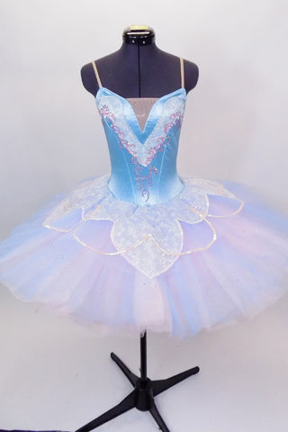 Aqua satin, 5 panel bodice has lace & gold detailing with crystals & nude straps. 10 layer pleated professional tutu has pastel tulle & lace petal shaped overlay. Comes with crystal tiara. Front