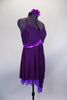 Eggplant dress has leotard base with cross straps & fine pleated gold-flecked bodice with pinch front. Dress has purple metallic band below the empire waist. Comes with floral hair accessory. Side