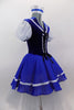 Blue & white sailor themed romantic ballet dress has white pouf sleeves & velvet bodice with lace-up  front. Blue skirt overlay & collar have white ribbon edge over layers of white tulle. Comes with matching sailor hat. Right side