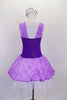 Lavender tutu dress has purple floral print skirt, front center & shoulders, with dark purple sides & back. There is a pleated white 3-layer tutu below skirt. Comes with matching hair accessory. Back
