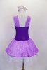 Lavender tutu dress has purple floral print skirt, front center & shoulders, with dark purple sides & back. There is a pleated white 3-layer tutu below skirt. Comes with matching hair accessory. Back