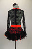 Black lace dress has glittery orange underlay at skirt and bust area & bright orange neckline & belt with crystal buckle for bling. Comes with hair accessory. Back