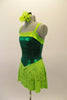 Emerald green leotard tank dress has apple green accent at bust and a chiffon floral apple green short skirt. Shows beautifully on stage. Comes with a floral hair accessory. Left side