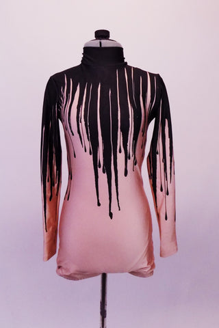 Uniquely creative nude based short unitard has long sleeves high neck and small keyhole back. The costume appears to have black paint or melted wax spilling down from the neck running and dripping down the torso. Front