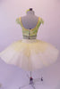 Professional pleated & hand tacked, 9-layer pancake tutu is two-piece. The tutu has an ivory basque & gold crystal tulle overlay with sequin accents & appliqued flowers. The bodice is a crop style top with pearl beaded fringe, gold & green sequined, applique floral lace & scalloped cap sleeves. Comes with hair flower. Back