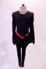Jerry’s skate costume great for warm-up is black leggings with a colourful floral stripe down the legs. The matching dress style tunic top has pouffe upper sleeve and peplum style ruffle. The bright floral pattern in the shoulders and sleeves complement the stripe in the leggings and the waistband of the tunic. Back