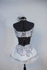 White and silver halter neck top with  long sleeves and a corset  lace-up back.Has black bow-tie accent .Comes with panty and white-silver, petticoat skirt. Back