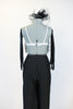 Black pin-stripe Zoot-Suit pant with a white/silver sequined &crystal bra that has fringe of dangling beads. Includes black headpiece and long gloves . Back
