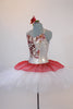 White platter tutu, has crimson glitter chiffon overlay White leotard has a front panel with gold & red sequined flower design. Comes with rose hair accessory. Side