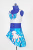 Turquoise sparkle skirt with silver polk-a-dots, white petticoat skirt & pink poodle.Separate pink panty and white half-top with matching turquoise bow accent. Side