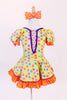 Yellow bodysuit with coloured polk-a-dots,purple sequin trim & mesh insert with crystals, has matching skirt with  petticoat & orange crystal bow hair piece.Front 