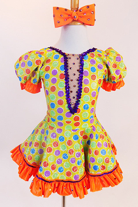 Yellow bodysuit with coloured polk-a-dots,purple sequin trim & mesh insert with crystals, has matching skirt with  petticoat & orange crystal bow hair piece.Front zoom