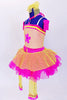 Yellow stretch net dress over bright pink skirt with a large  flower applique on the front of the bodice. Comes with  gauntlets, mesh leg warmers, and hair bow. Side