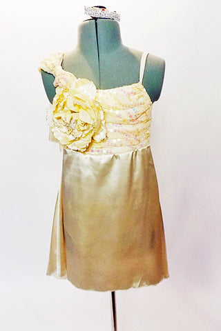 Cream satin baby-doll dress with attached panty. The bodice is s covered with a gold sequined lace with soft  bow & flower accent on the right shoulder. Front