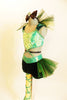 Green  half-top is covered with crystals and tulle collar. The bottom is a dark green velvet with  accent on the left hip & green straps wrap around  leg. Side