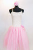 Soft pink nylon and tulle romantic ballet tutu dress has bodice with glitter cream lace and rose floral hair accessory. Front