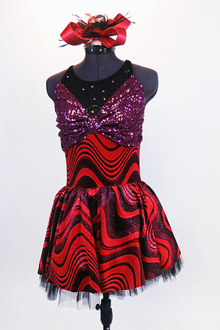 Red dress has groovy swirl pattern  & tulle underskirt.. The bodice is tank style with black mesh base and purple sequin front. Comes with matching hair piece. Front zoom