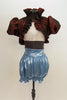 White velvet bra-top with gold pattern & burgundy iridescent taffeta shrug with ruffle and &pouf sleeves. Has light blue metallic pantaloon high waisted short. Front