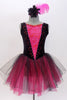 Black velvet tank leotard has pink lace insert in the bodice. Has an attached black and pink tulle romantic tutu skirt. Comes with  feather hair accessory. Front Zoom