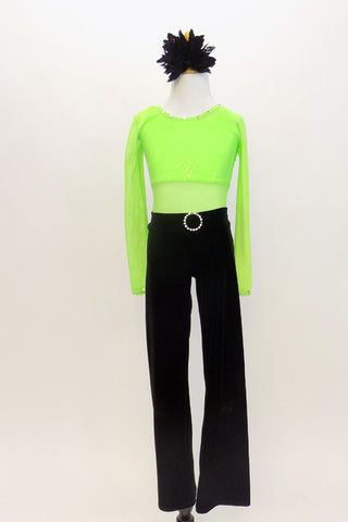 Neon green, half top rests under green, mesh, long sleeved leotard. Has black velvet pants with jeweled buckle . Comes with black hair accessory. Front