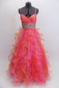 Full length A-line Mac Duggal , coral organza gown, has layers of curly organza ruffles, ruched crossover bust a and a wide Swarovski crystal waistband. Front