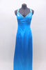 Floor length satin turquoise gown has jeweled trim at bust. The straps from the shoulder and bottom of bust line cross over at back. Has long chiffon train. Front