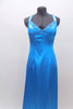 Floor length satin turquoise gown has jeweled trim at bust. The straps from the shoulder and bottom of bust line cross over at back. Has long chiffon train. Front zoom