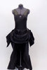 Black ruched back, long sateen dress has short draped front for easy movement with crystal broach accents . Layered bustle effect carries through to  back. Front
