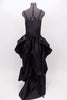 Black ruched back, long sateen dress has short draped front for easy movement with crystal broach accents . Layered bustle effect carries through to  back. Back