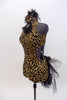 Leopard print high neck leotard has front feather-broach accent & low back.Bustle has layers of black tulle and chiffon .Comes with matching hair accessory. Side