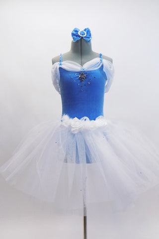 Blue leotard has draped white chiffon on bodice & large blue crystal broach accent. Has  long pull on tutu skirt with blue crystals & matching hair accessory. Front