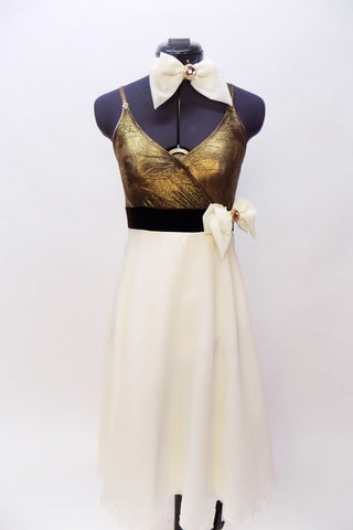  A-line dress has antique gold bust attached to long ivory layered chiffon skirt. Brown velvet waist band has crystal broach/bow accent & matching hair piece. Front