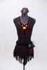 Halter neck dress has criss-cross straps & plunging front with orange bust panel, Has fringe skirt & belt with feathers, broach  & matching hair piece. Front