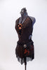 Halter neck dress has criss-cross straps & plunging front with orange bust panel, Has fringe skirt & belt with feathers, broach  & matching hair piece. Side      