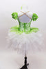 Green embroidered beaded lace tutu bodice has attached lace overlay which sits on top of white tutu. Comes with lace arm poufs and green floral hair accessory. Back