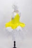 Yellow velvet overlay with white feathers rests on white tutu skirt. Matching leotard has large white crystal & feather accent &large white feather hair piece. Side