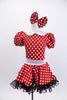 Red and white polk-a-dot dress has black petticoat with red sequin trim.Has white belt,collar & gloves. Comes with matching polk-a-dot hair bow. Front