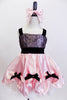 Pink satin dress is scalloped over white petticoat withk bows. Bodice has  black sequined lace overlay with pink crystals Has crystal covered pink hair bow. NEW Front