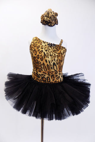 Cheetah print one shoulder tank leotard has pull-on black tutu. Fringed overlay can be worn separately. Has crystal broach accent & matching hair accessory NEW. Front