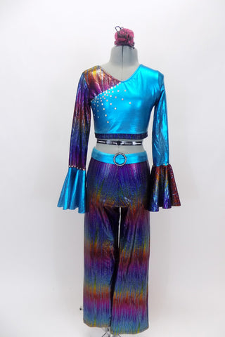 Turquoise iridescent two-piece long sleeved  half top with sleeve ruffles. The top is covered with crystals. Has crystal belt  buckle & matching hair accessory. Front