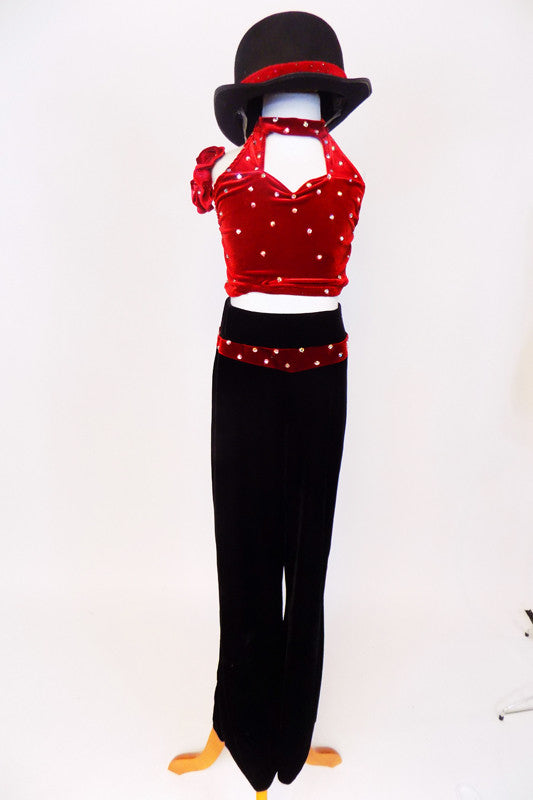 Black velvet pants with red crystalled waistband has a matching red velvet, crystal covered, halter  half top. Comes with hair accessory &  bowler hat. Front