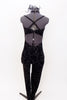 Black velvet swirled pattern, acro costume has low back & cross straps  The tone on tone pattern with stirrups on feet.  Comes with matching hair accessory. Back