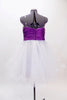 White curly edge tulle boned dress has ruched purple satin waist band with large jewel accents. There is scattered amethyst Swarovski crystals throughout dress. Back
