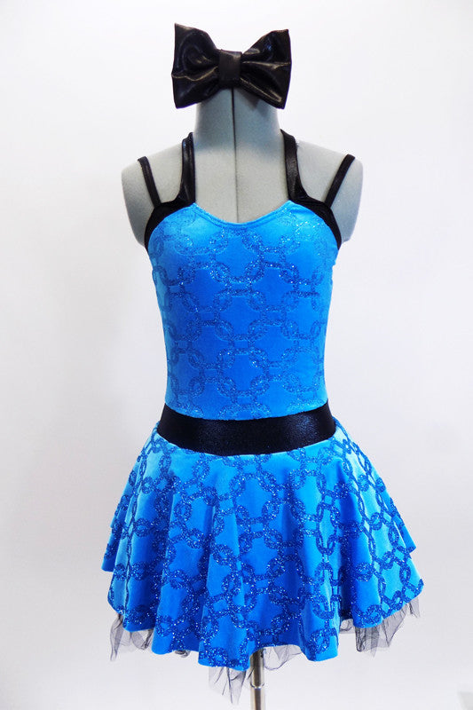 Bright aqua-blue patterned leotard dress has black waistband, double shoulder straps and a matching black hair bow. Front zoom